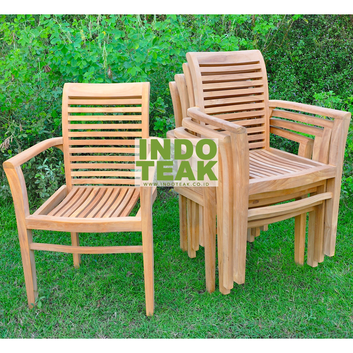 Luxury stackable solid teak arm chair handcrafted in Indonesia from sustainable Grade A plantation teak wood for hotels, restaurants, resorts, cafés, and elegant outdoor living spaces.